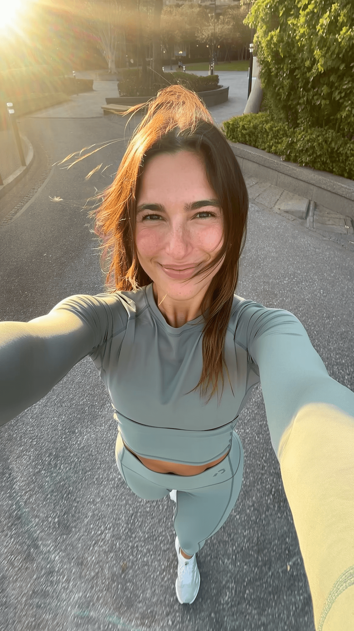 Confident wellness selfie in natural light